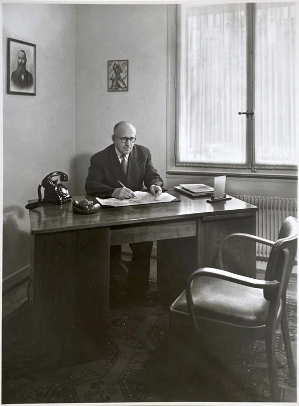 Leon Zuckermann at his desk in the Benedict factory, circa 1950s